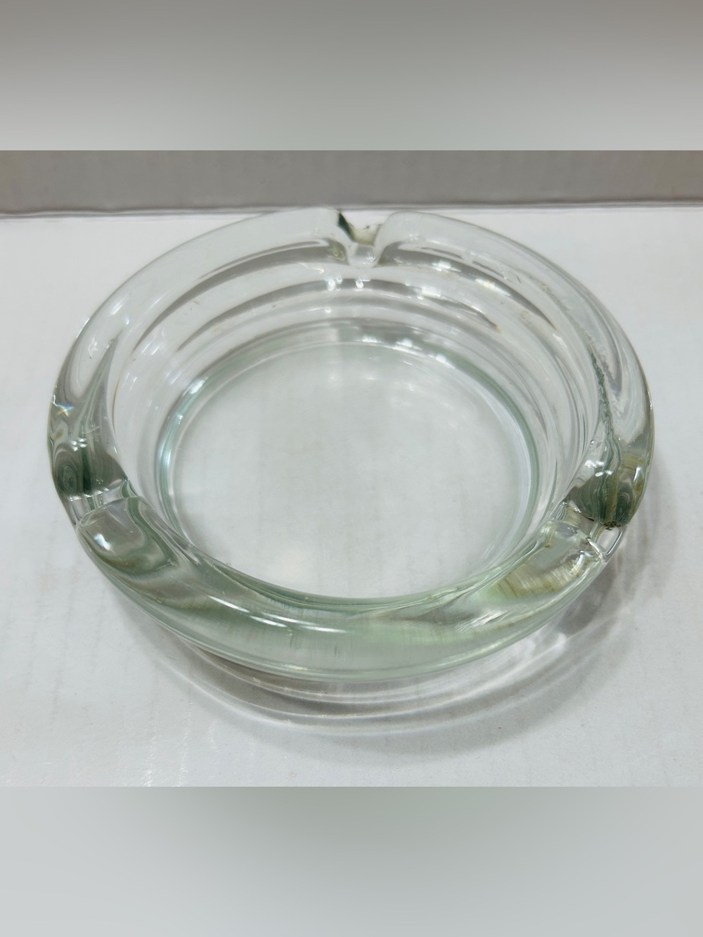 Vintage ashtray, clear, heavy glass, 3 slots.